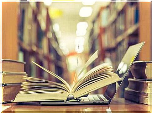 Books and Laptop in a Library