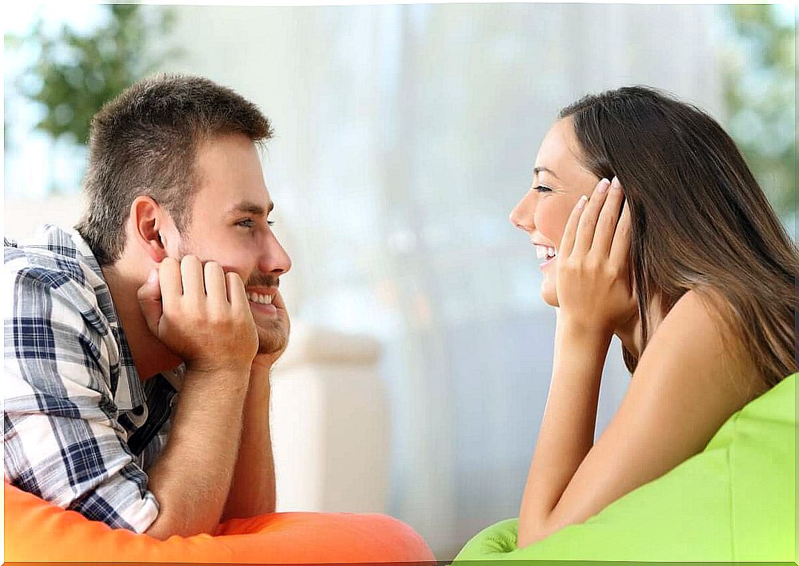 couple smiling and looking at each other