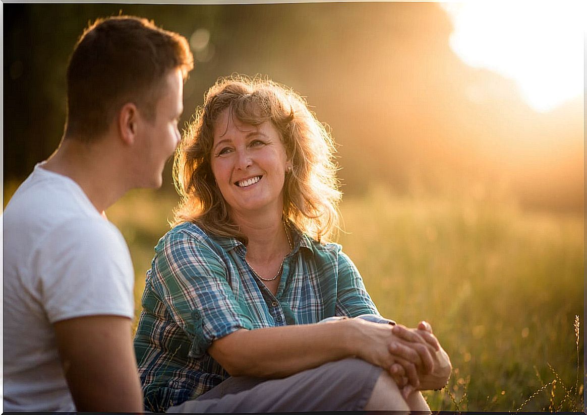 Mother talking to one of her adoptive children