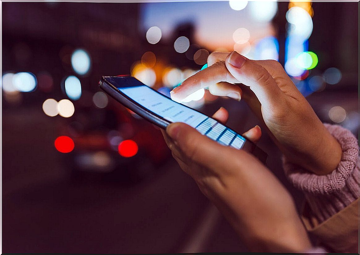 woman using cell phone