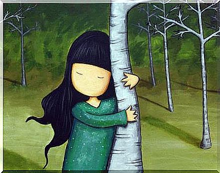 girl hugging a tree