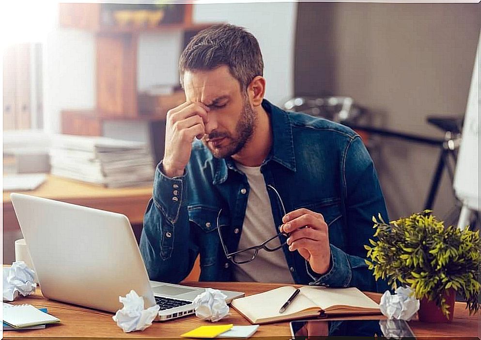 man stressed at work