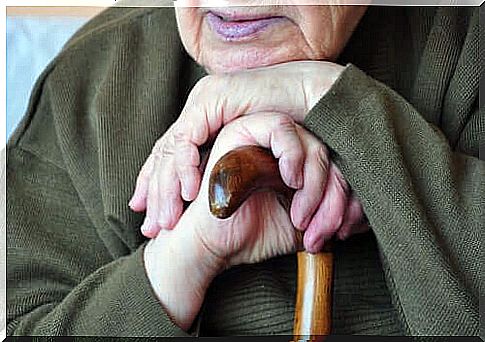 elderly person with cane