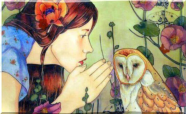 woman in front of an owl